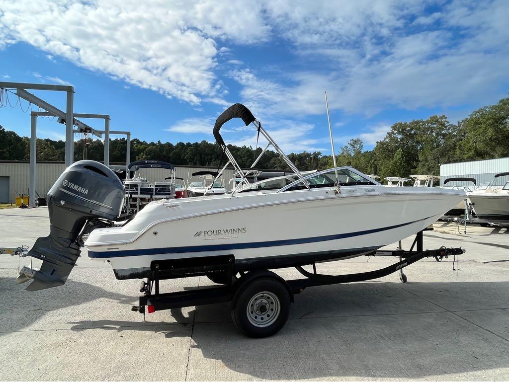 Slide: The Image of 2020 Four Winns HD 200 OB boat on trailer with Yamaha outboard motor. - 27