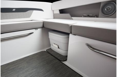 Slide: The Image of 2020 Four Winns HD 200 OB boat interior with seating and storage. - 8