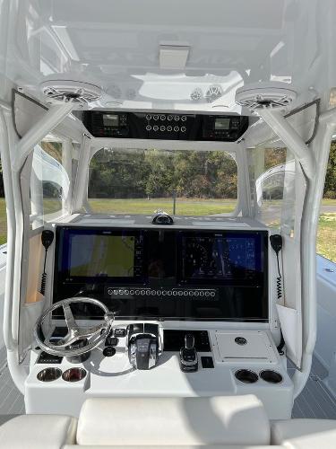 Slide: The Image of 2022 Freeman 37 VH boat cockpit with advanced navigation and control systems. - 10
