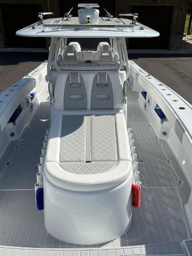 Slide: The Image of 2022 Freeman 37 VH boat interior with white seating and deck. - 13