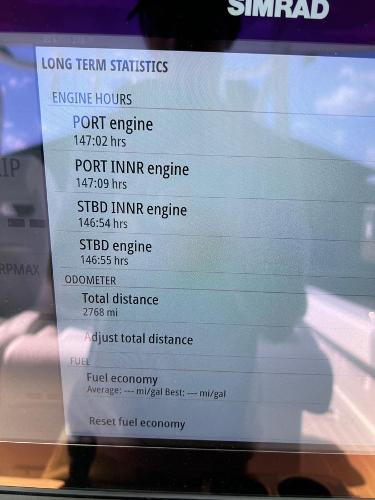 Slide: The Image of Freeman 37 VH 2022 boat engine hours and odometer statistics on Simrad display. - 17