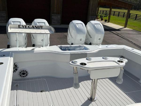 Slide: The Image of Freeman 37 VH 2022 boat deck with four outboard engines and fishing station. - 2