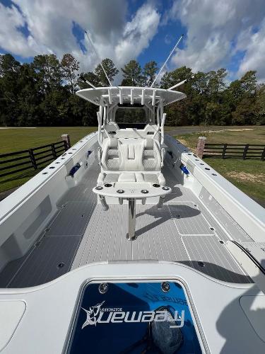 Slide: The Image of 2022 Freeman 37 VH boat with spacious deck and seating. - 3