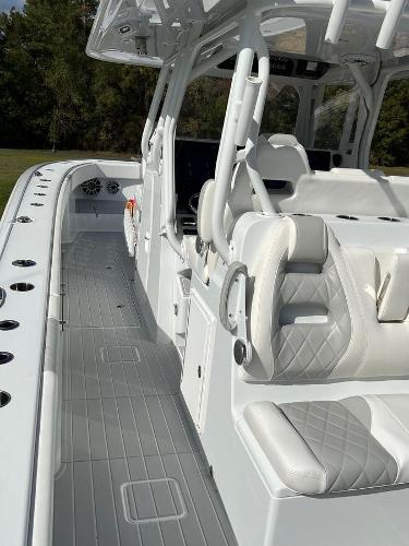 Slide: The Image of 2022 Freeman 37 VH boat with white leather seating and spacious deck. - 6