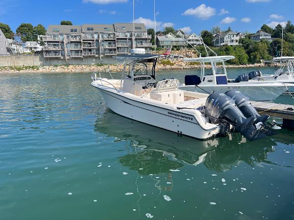 Slide: The Image of 2005 Grady-White 283 RELEASE boat docked in a scenic marina. - 1