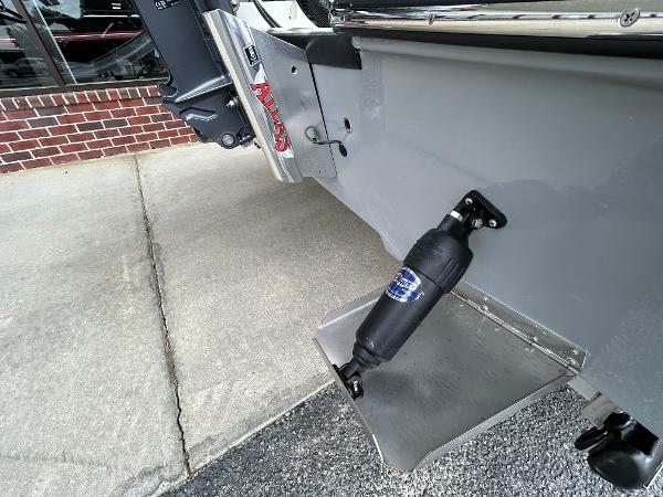 Slide: The Image of 2024 Hewes Redfisher 18 boat transom with hydraulic jack plate and trim tab. - 15