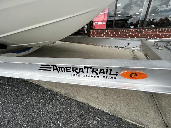 Slide: The Image of 2024 Hewes Redfisher 18 boat on AmeraTrail trailer outside dealership. - 4