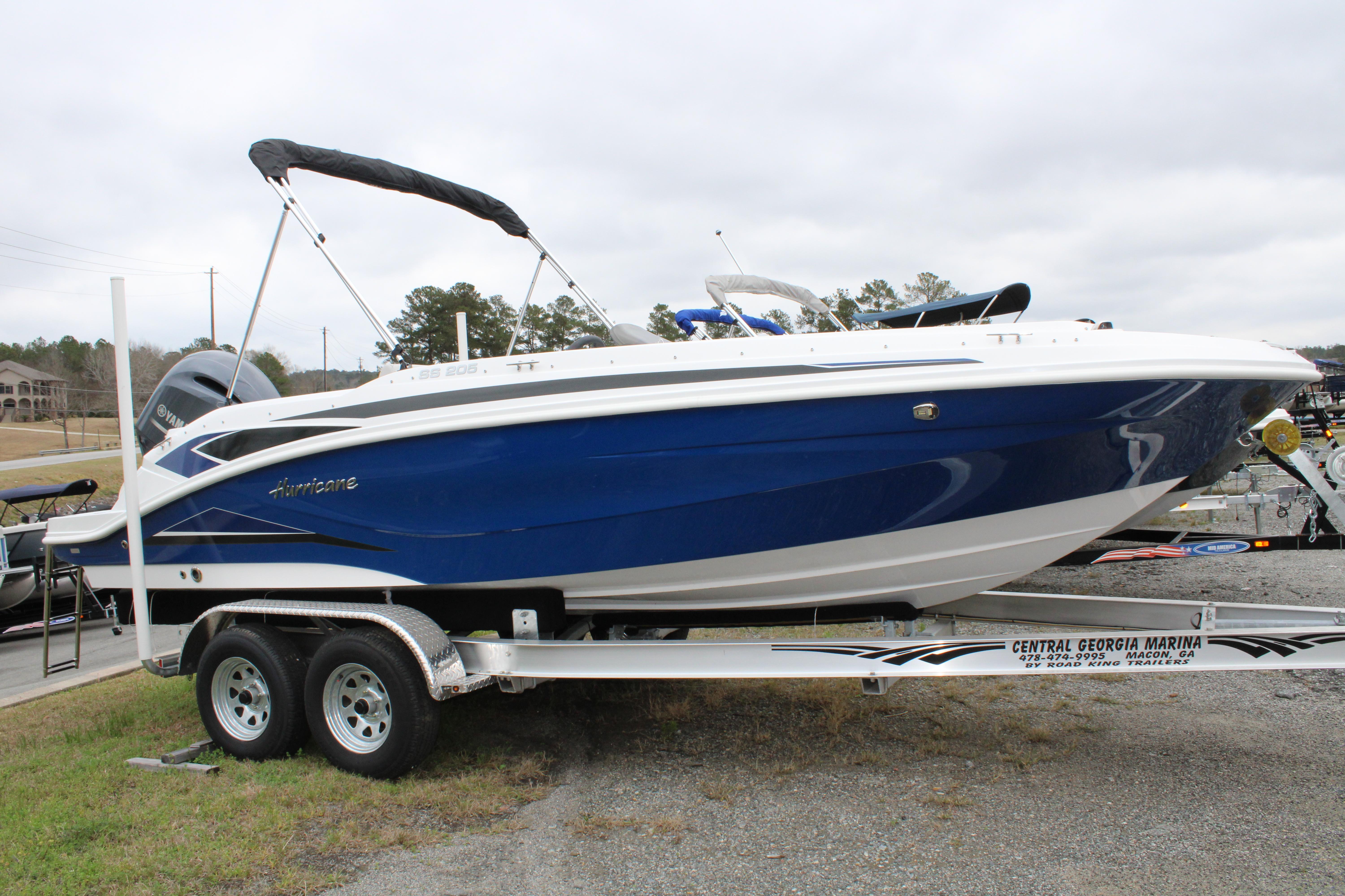 Slide: The Image of 2023 Hurricane SunDeck Sport 205 OB boat on trailer at Central Georgia Marina. - 1