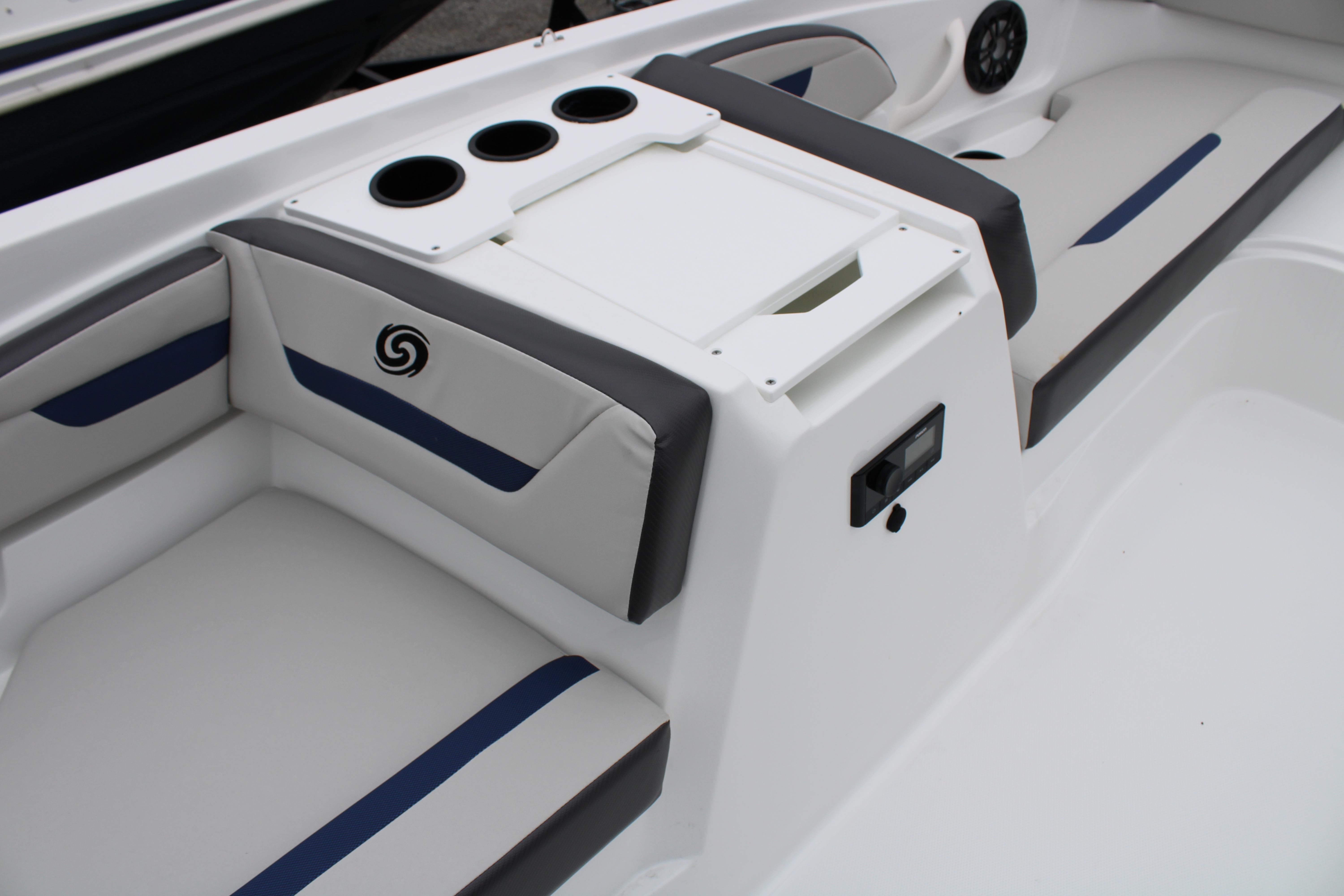 Slide: The Image of Interior seating and console of 2023 Hurricane SunDeck Sport 205 OB boat. - 15