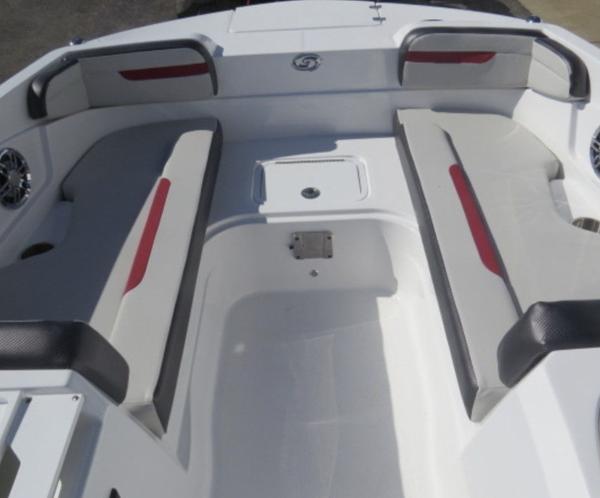 Slide: The Image of Interior seating of 2023 Hurricane SunDeck Sport 205 OB boat with white and red cushions. - 16
