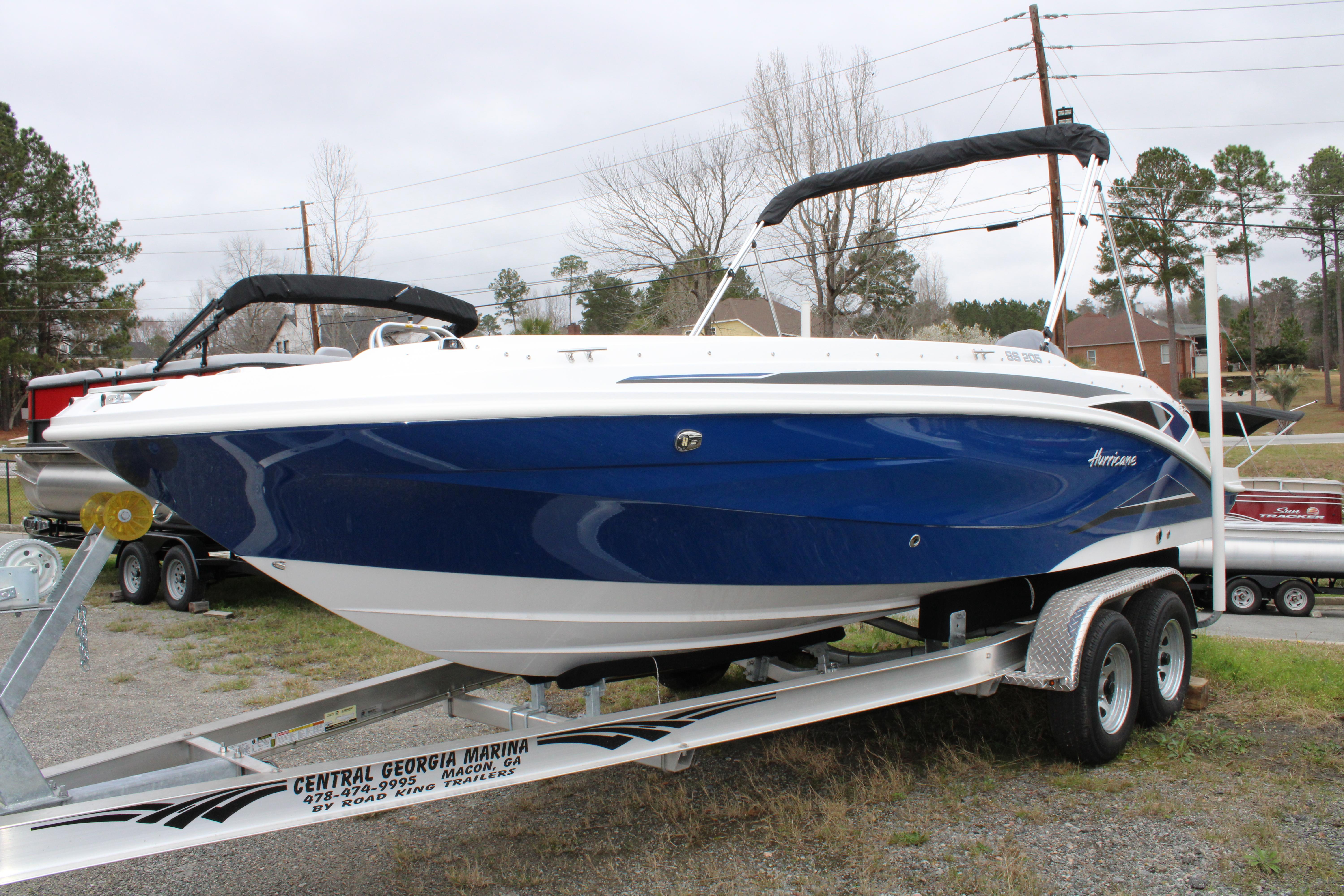 Slide: The Image of 2023 Hurricane SunDeck Sport 205 OB boat on trailer at Central Georgia Marina. - 2