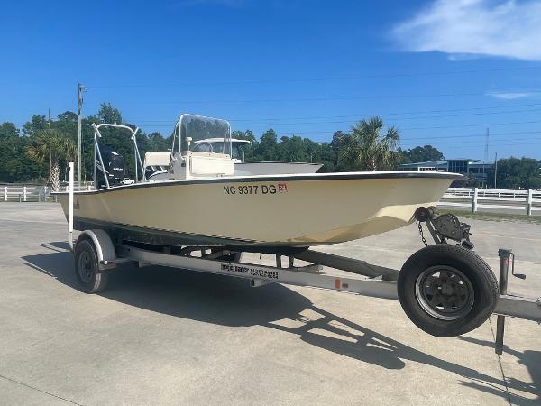 Slide: The Image of 2006 Intruder Pro Marine 20 boat on trailer in sunny outdoor setting. - 3