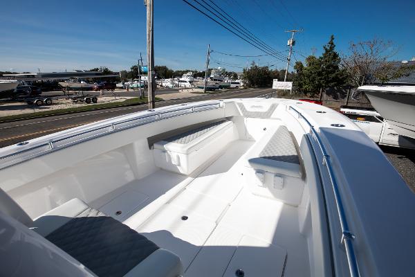 Slide: The Image of 2023 Invincible 33 Open Fisherman boat with spacious seating and modern design. - 2