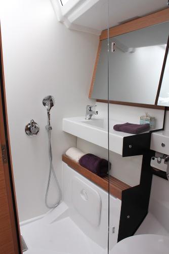 Slide: The Image of 2025 Jeanneau Sun Odyssey 440 bathroom with modern fixtures and sleek design. - 10