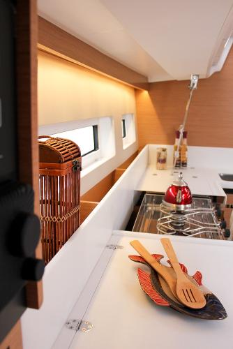 Slide: The Image of Interior of 2025 Jeanneau Sun Odyssey 440 yacht kitchen with modern design elements. - 35