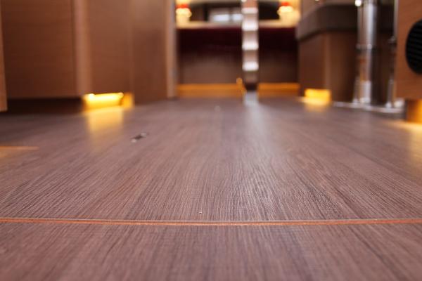 Slide: The Image of Interior view of 2025 Jeanneau Sun Odyssey 440 yacht with wooden flooring. - 43