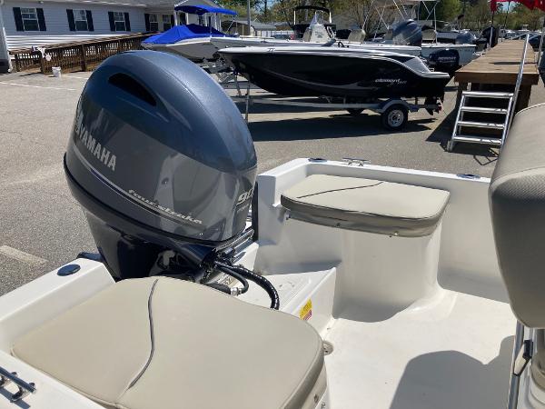 Slide: The Image of 2024 Key West 1720 Sportsman boat with Yamaha outboard motor in a marina. - 12