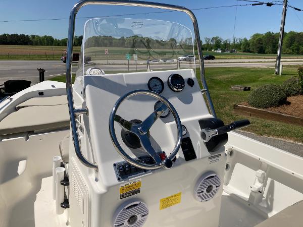 Slide: The Image of 2024 Key West 1720 Sportsman boat console with steering wheel and gauges. - 5