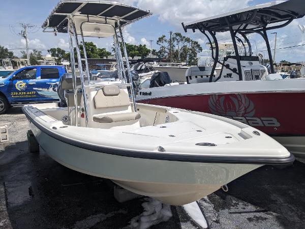 Slide: The Image of 2024 Key West 188 Bay Reef boat with T-top in marina. - 1