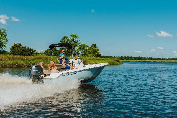 Slide: The Image of 2024 Key West 189 FS boat cruising on a serene lake. - 15