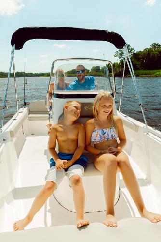 Slide: The Image of Family enjoying a day on a 2024 Key West 189 FS boat. - 17