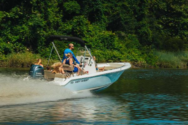 Slide: The Image of 2024 Key West 189 FS boat cruising on a lake with passengers. - 27