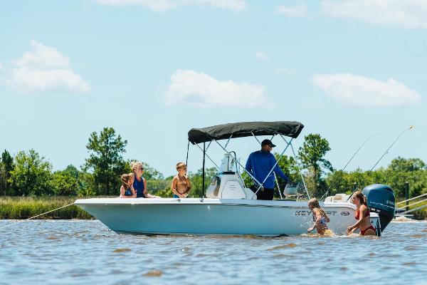 Slide: The Image of 2024 Key West 189 FS boat with family enjoying water activities. - 36
