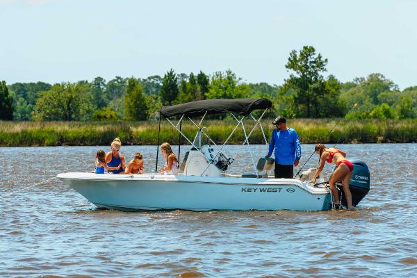 Slide: The Image of 2024 Key West 189 FS boat on a lake with people enjoying the water. - 38