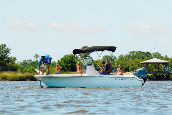 Slide: The Image of 2024 Key West 189 FS boat on a lake with people enjoying the water. - 39