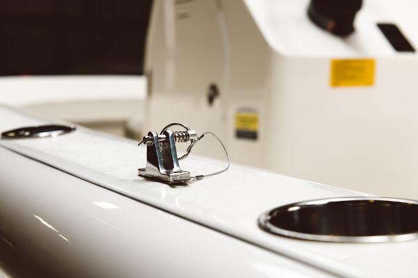 Slide: The Image of Close-up of 2024 Key West 189 FS boat's deck hardware and cup holders. - 44