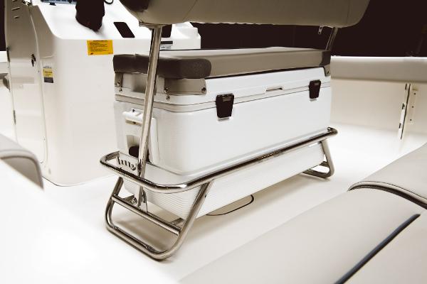 Slide: The Image of 2024 Key West 189 FS boat interior with cooler and seating. - 45