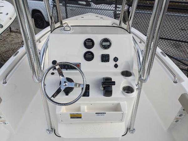 Slide: The Image of 2024 Key West 189 FS boat console with steering wheel and gauges. - 7