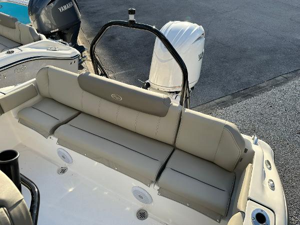Slide: The Image of 2024 Key West 219 FS boat with Yamaha engine, featuring comfortable seating. - 14