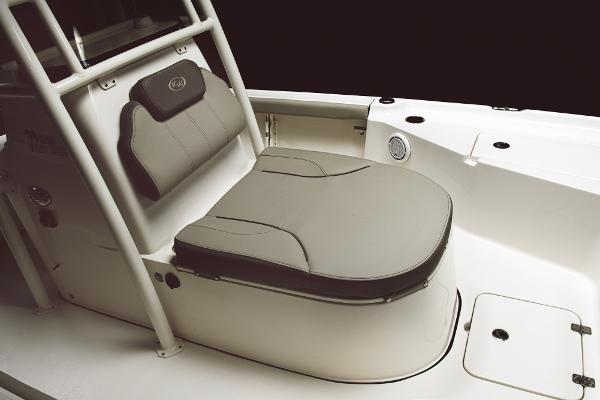 Slide: The Image of 2023 Key West 250 Bay Reef boat seating area with cushioned seat and backrest. - 26