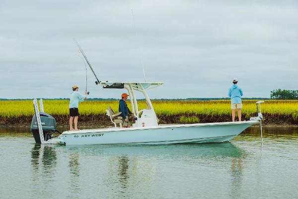 Slide: The Image of 2023 Key West 250 Bay Reef boat with anglers fishing in calm waters. - 39