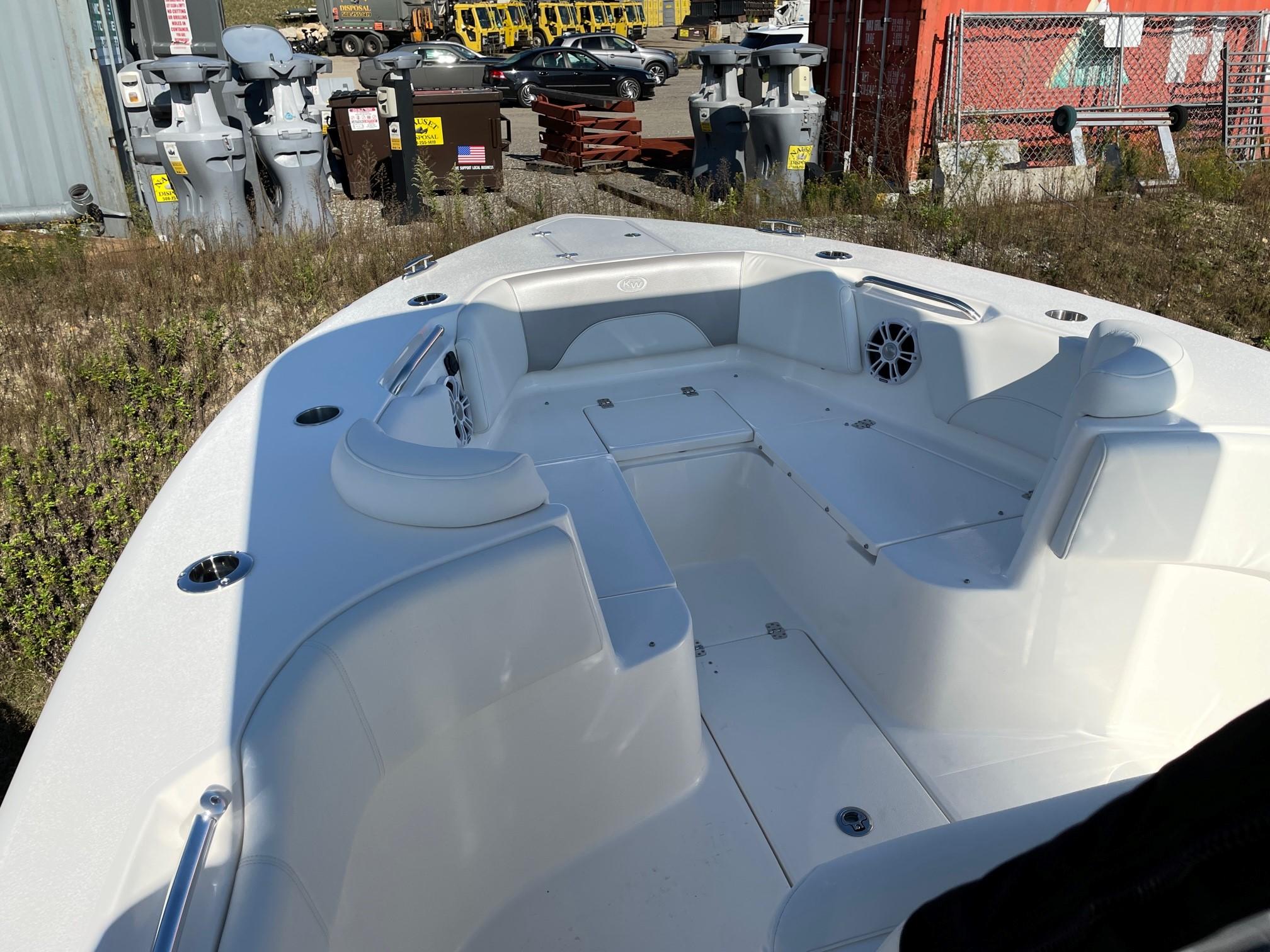 Slide: The Image of 2024 Key West 263 FS boat interior with seating and storage compartments. - 3