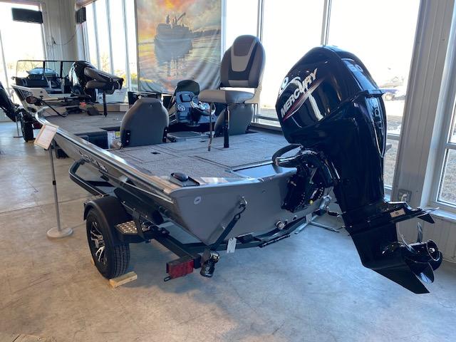 Slide: The Image of 2024 Lowe Stinger 175 Crappie fishing boat with Mercury outboard motor in showroom. - 3