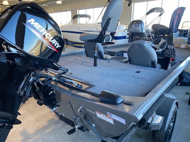 Slide: The Image of 2024 Lowe Stinger 175 Crappie fishing boat with Mercury outboard motor in showroom. - 5