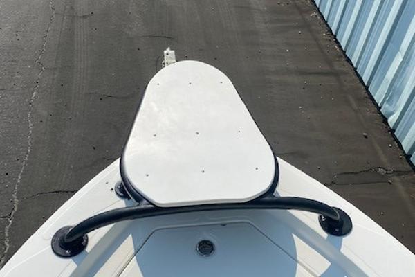 Slide: The Image of 2011 Mako 2201 Inshore boat bow with white deck and railing. - 7