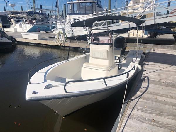 Slide: The Image of 2021 May-Craft 1800 Skiff boat docked at a marina. - 4