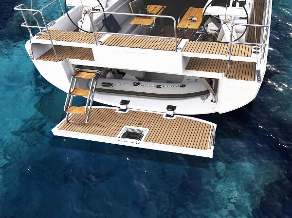 Slide: The Image of 2025 Moody 48 Deck Saloon yacht with open swim platform on clear blue water. - 3