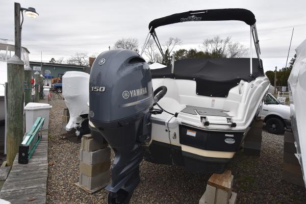 Slide: The Image of 2021 NauticStar 223 DC boat with Yamaha 150 engine on dry dock. - 3