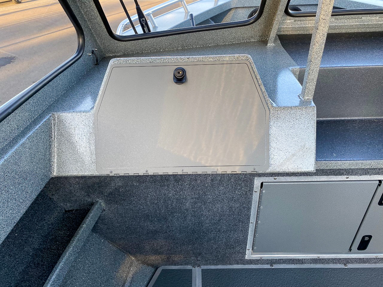 Slide: The Image of Interior view of 2025 North River 22 Seahawk boat showing storage compartments. - 14