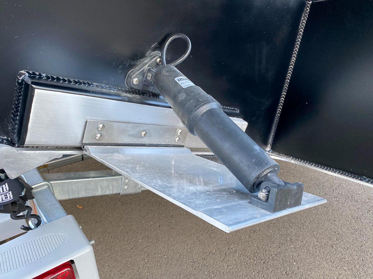Slide: The Image of Close-up of the trim tab on a 2025 North River 22 Seahawk boat. - 27