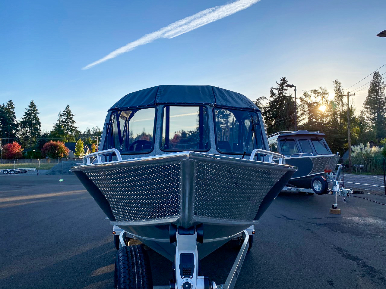 Slide: The Image of 2025 North River 22 Seahawk boat on trailer at sunset. - 8