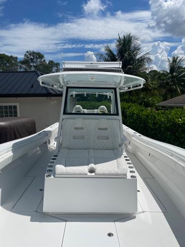 Slide: The Image of 2021 Onslow Bay 41 Tournament Edition boat with sleek white design and spacious deck. - 13
