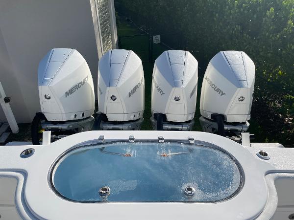Slide: The Image of 2021 Onslow Bay 41 Tournament Edition with four Mercury outboard engines and a livewell. - 20