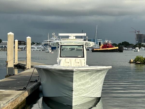 Slide: The Image of 2021 Onslow Bay 41 Tournament Edition boat docked at marina. - 3