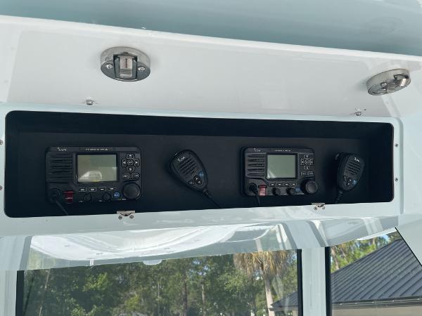 Slide: The Image of 2021 Onslow Bay 41 Tournament Edition boat radio equipment panel. - 9