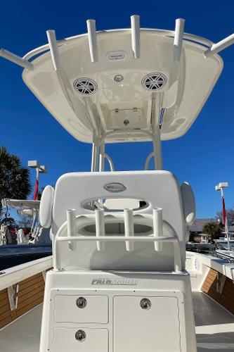 Slide: The Image of 2024 Pathfinder 2500 Hybrid boat with T-top and rod holders. - 13